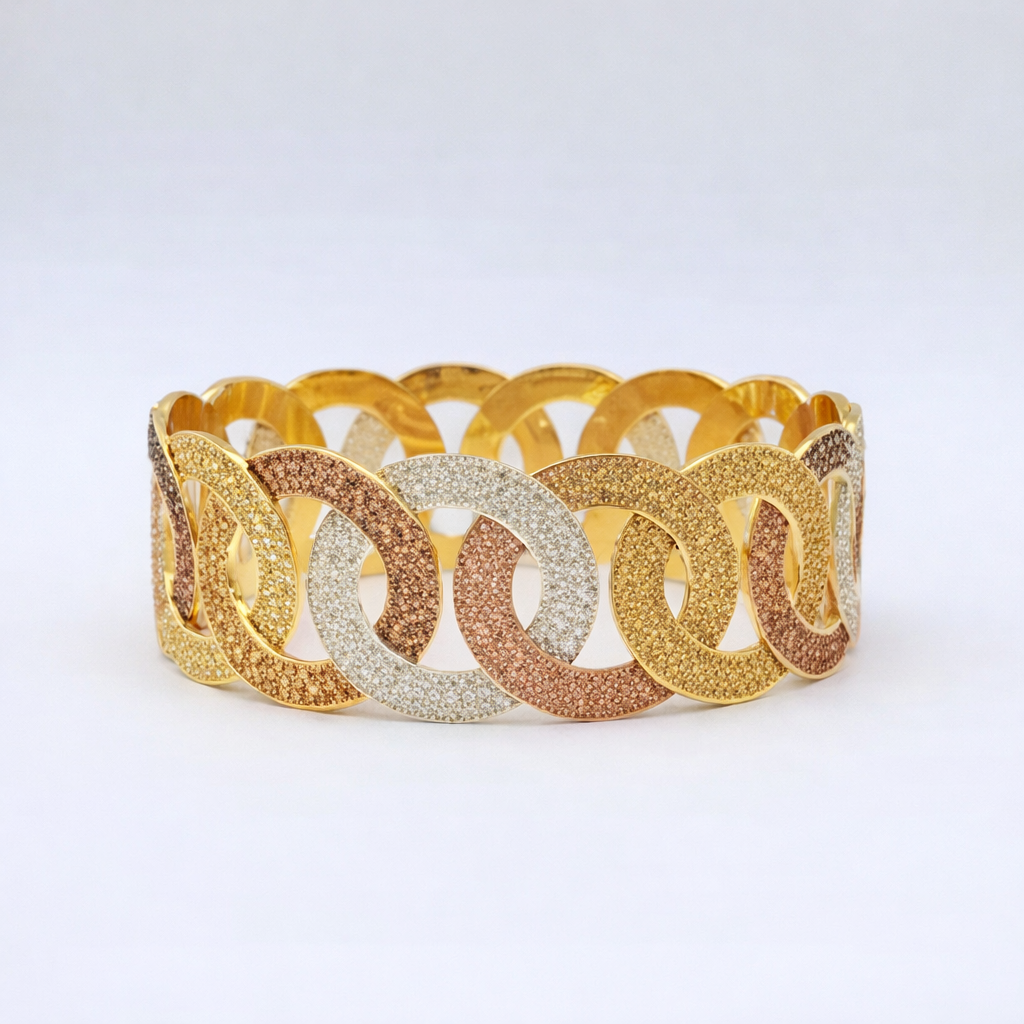 URBAN ORBIT TRI-TONE GOLD CUFF BRACELET